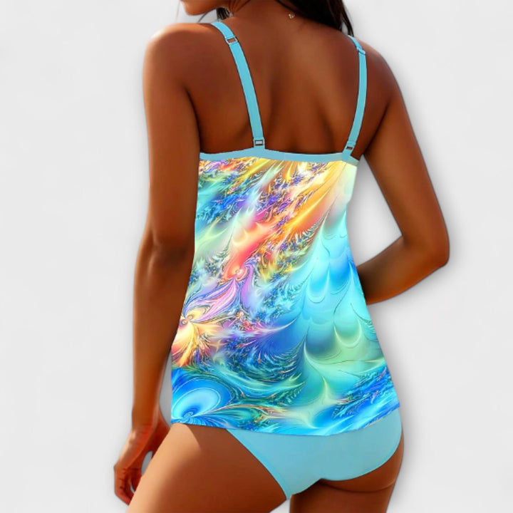 Vibrant women's tankini set with a unique print, ideal for poolside and vacation outfits.
