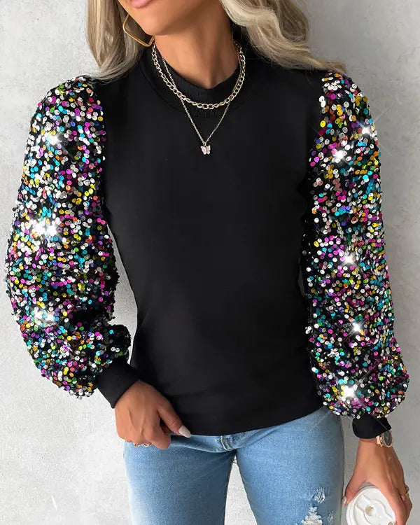 Women's colourful balloon sleeve blouse with sequin contrast panels, perfect for chic office wear or smart casual.