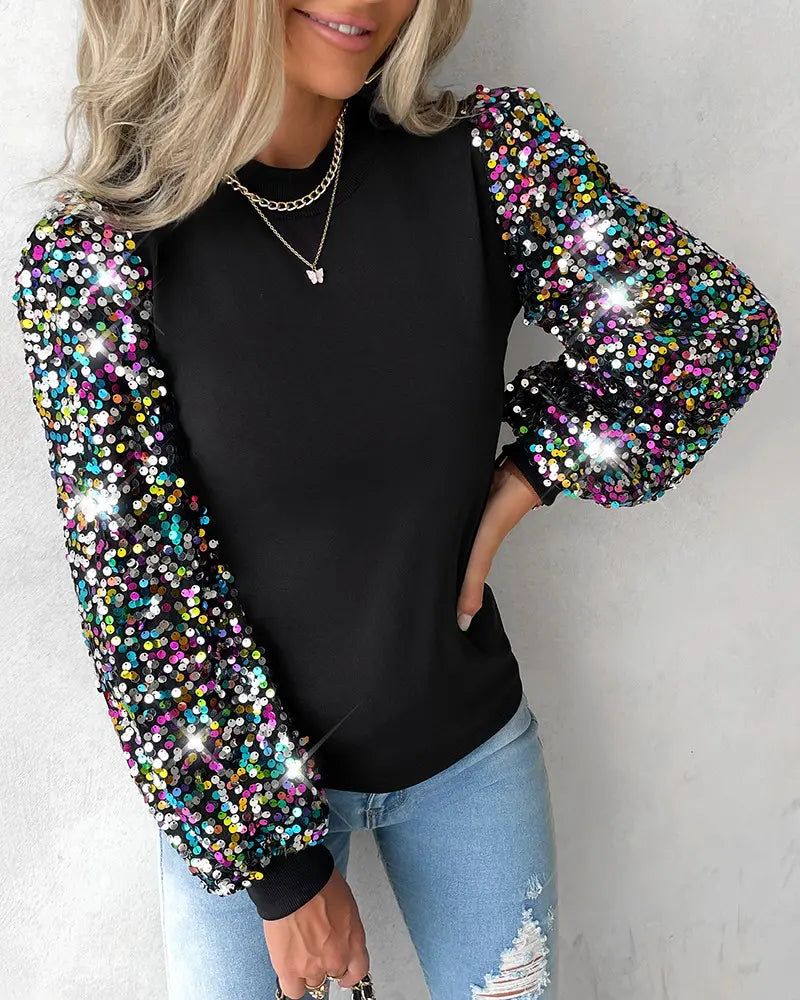 Versatile women's colourful blouse with dramatic balloon sleeves and chic contrast panels, ideal for statement style.