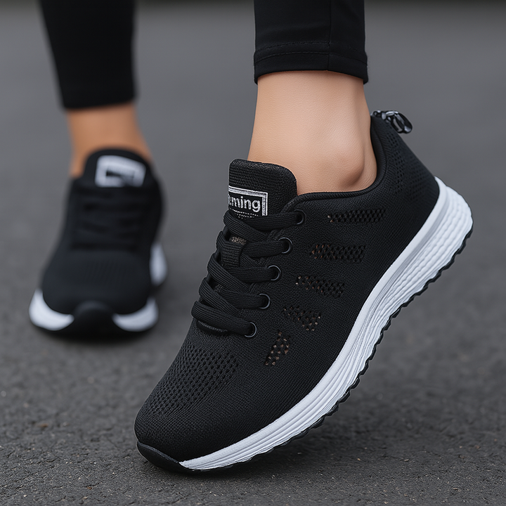 Stylish women's athletic shoe with breathable mesh upper and advanced arch support for comfort.