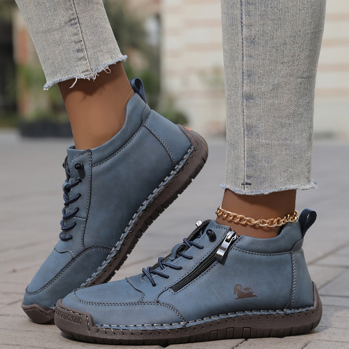 Stylish women's zip-up walking sneakers with a breathable upper for summer comfort.