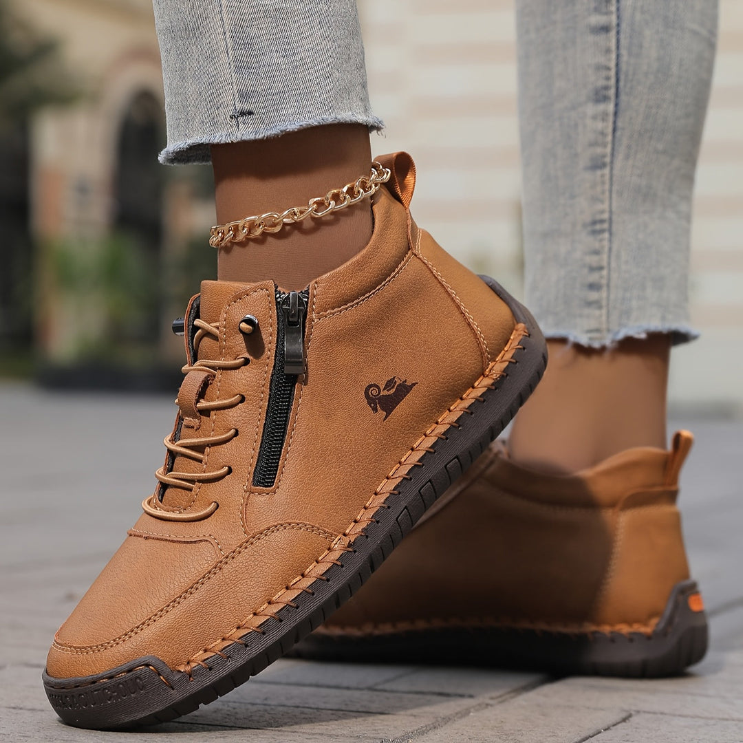 Angle shot of women's zip-up walking sneakers, highlighting textured material and comfort.