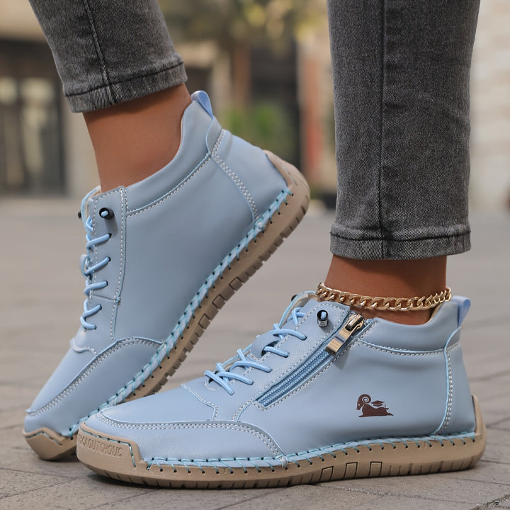 Comfortable women's zip-up sneakers, ideal walking shoes with a casual athletic style.