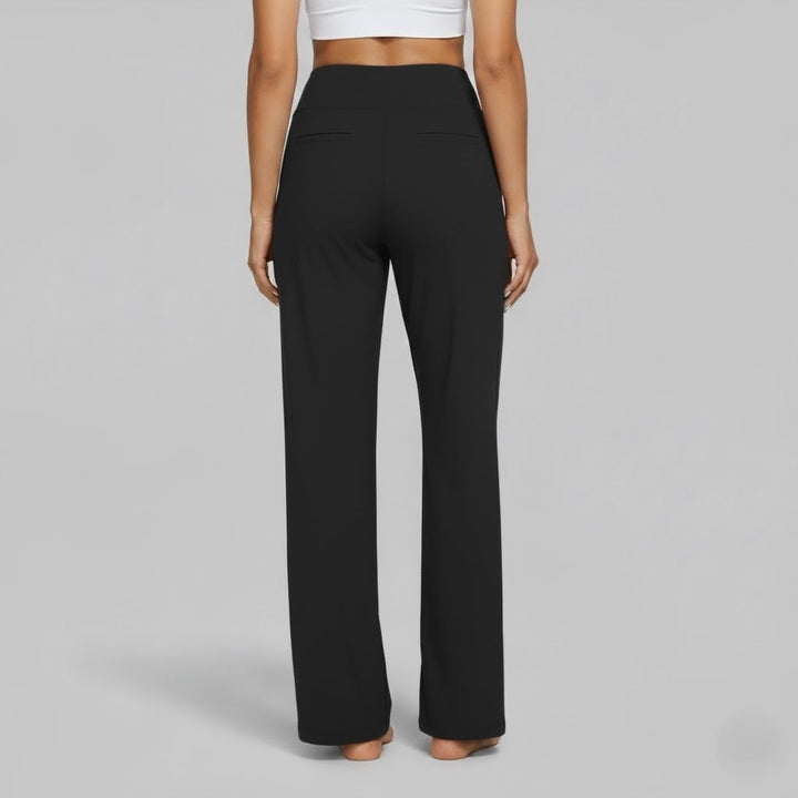 Woman walking in comfortable brown stretch pants, perfect for active casual wear.