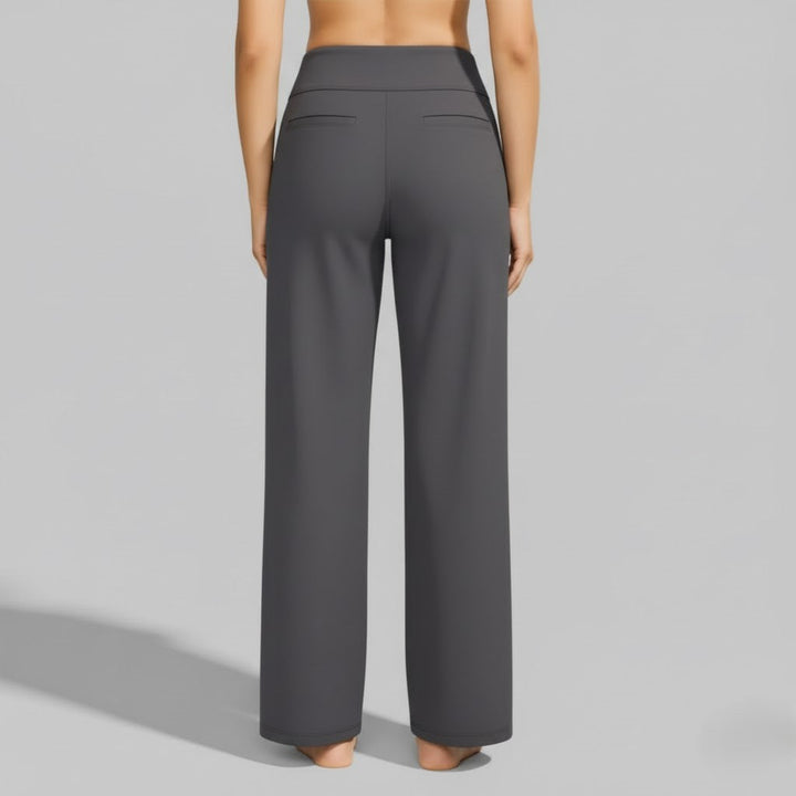 Full-length navy blue women's stretch pants, offering a comfortable fit for active individuals.