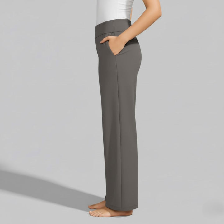 Women's maroon stretch pants, featuring a flattering cut and soft fabric for versatile styling.
