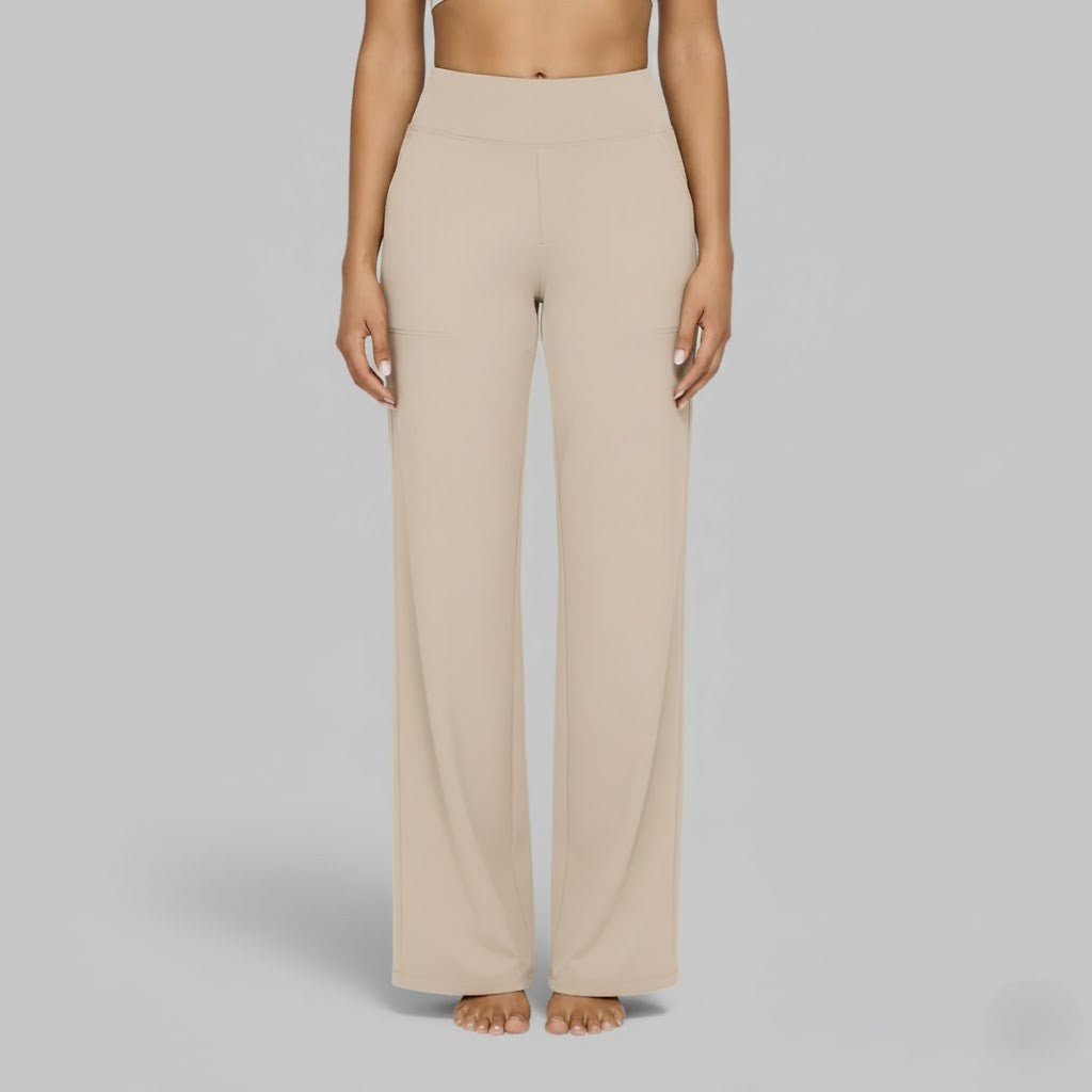 Close-up of a woman in comfortable olive green stretch trousers, showing fabric detail.