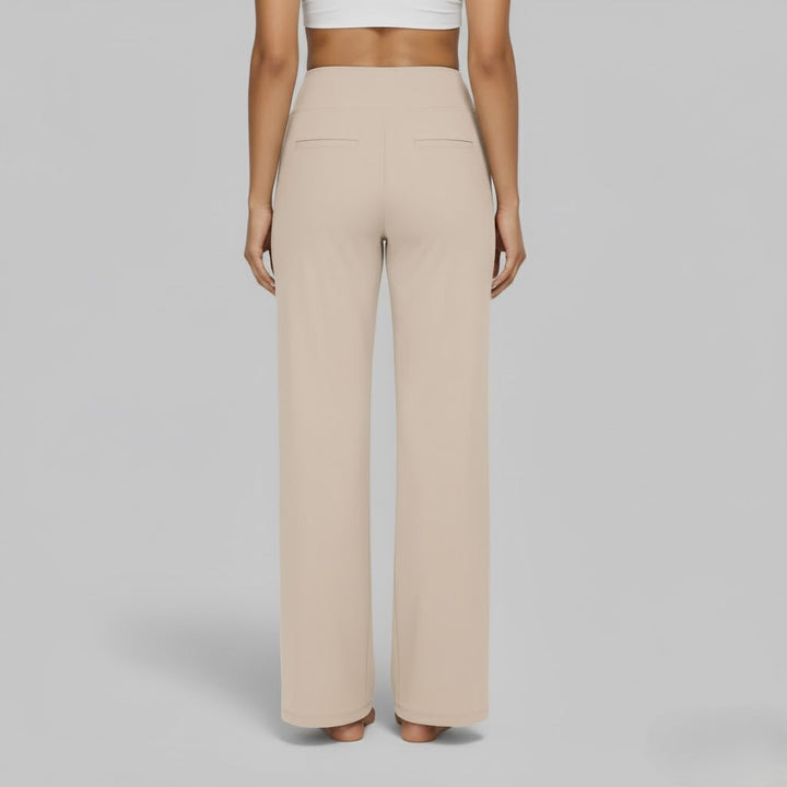 Woman posing in comfortable black stretch pants, highlighting their versatile casual wear appeal.