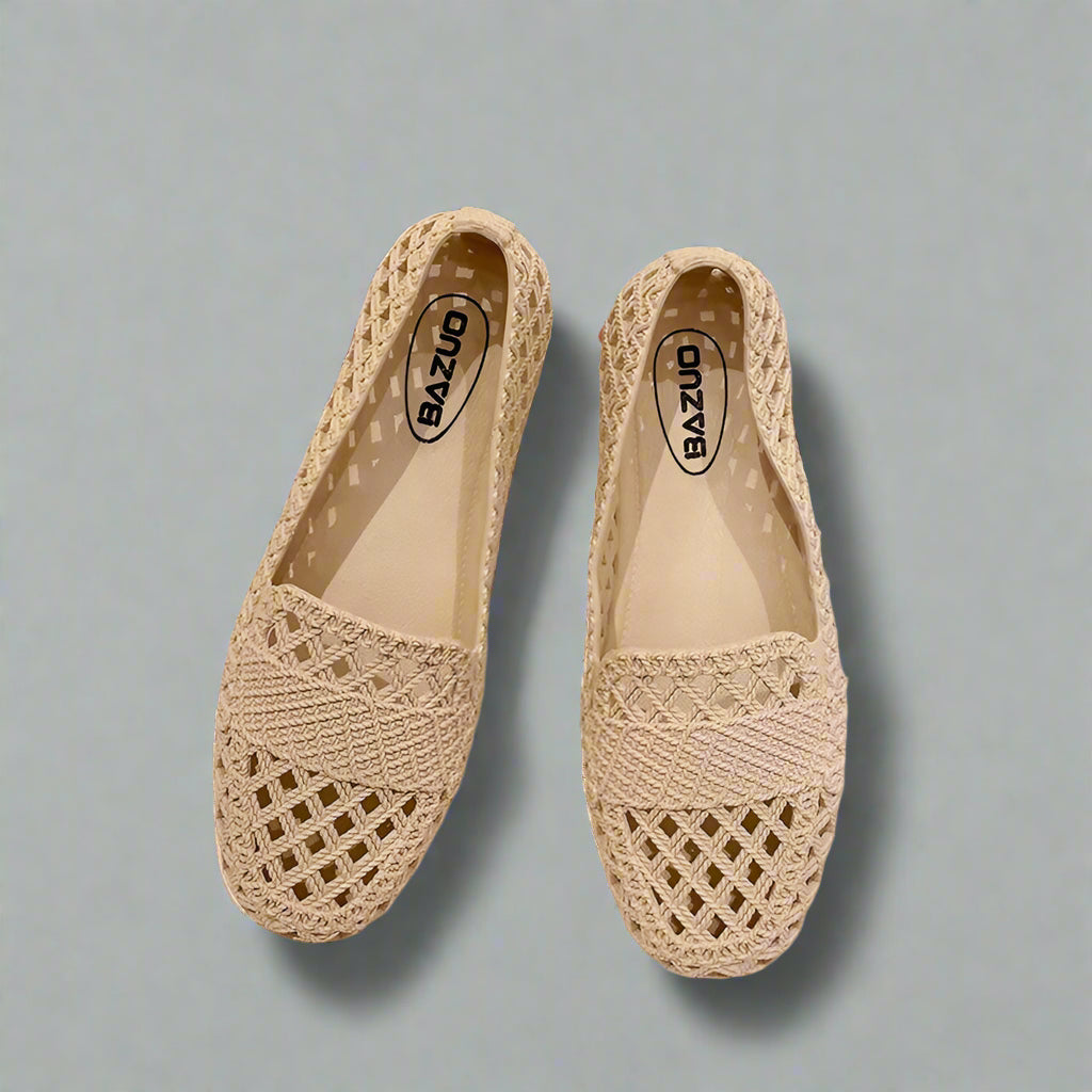 Stylish women's slip-on flats in a neutral color, perfect for all-day comfort and breathability