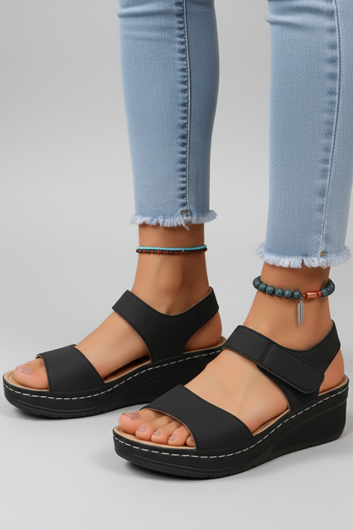 Fashionable white strappy wedge sandals for women, offering all-day comfort and summer style