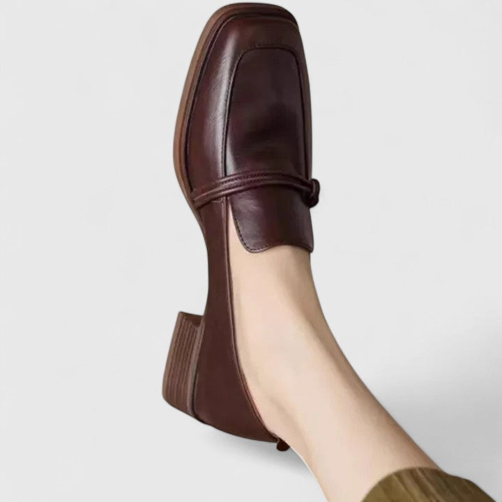 Top view of women's comfortable classic slip-on loafers, showcasing their sleek design for everyday casual shoes.