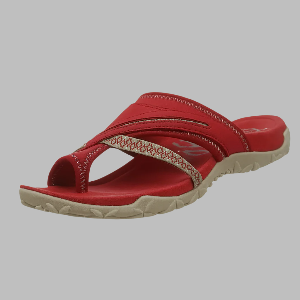 Close-up of comfortable women's flip-flops with intersecting cross straps, great for casual fashion.