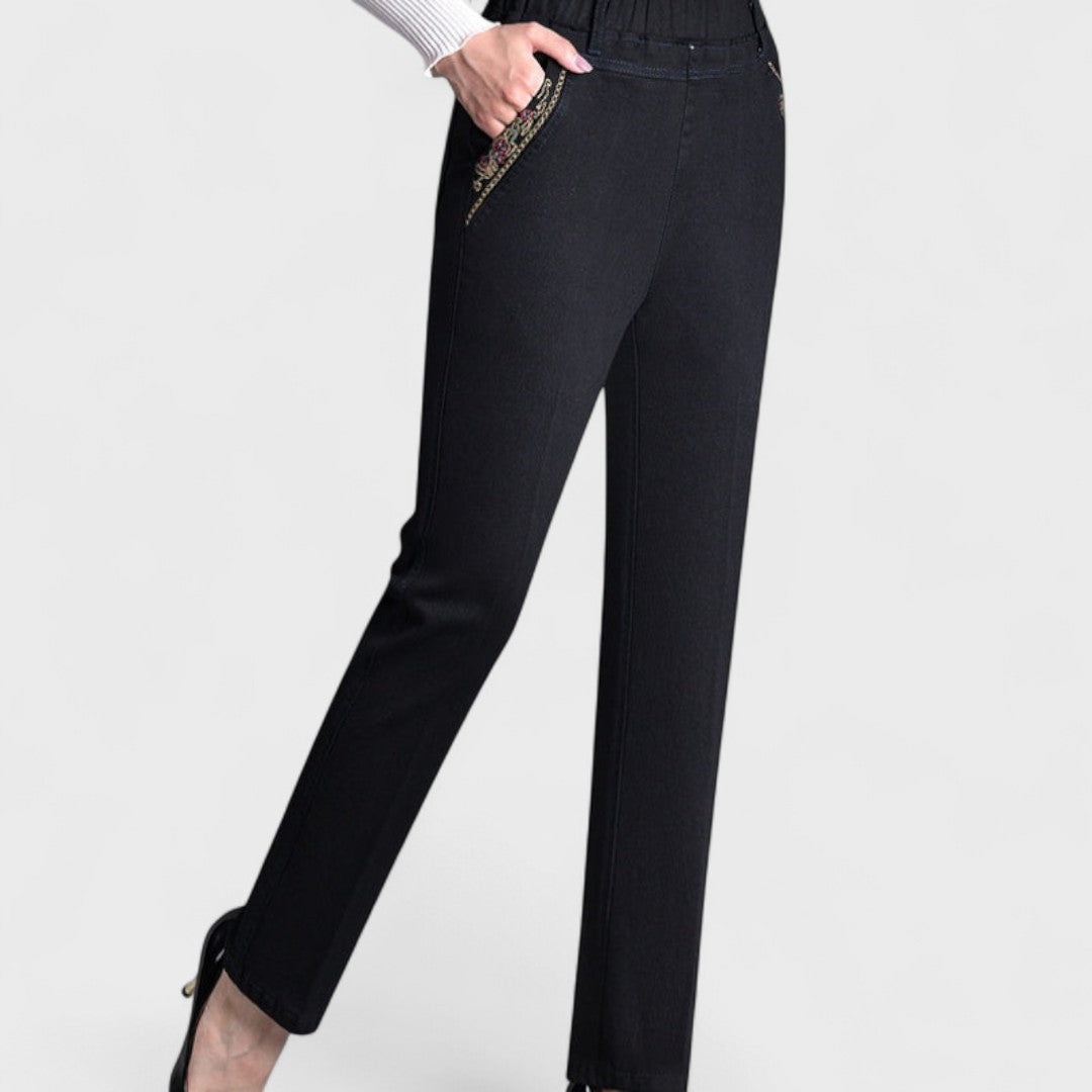 Flattering women's stretch jeans with elastic waistband and deep side pockets, versatile denim.