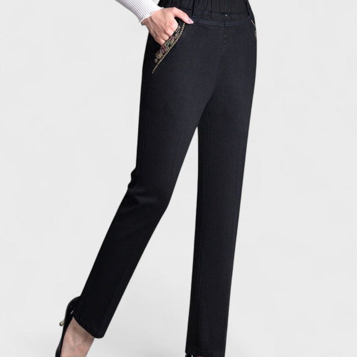 Flattering women's stretch jeans with elastic waistband and deep side pockets, versatile denim.