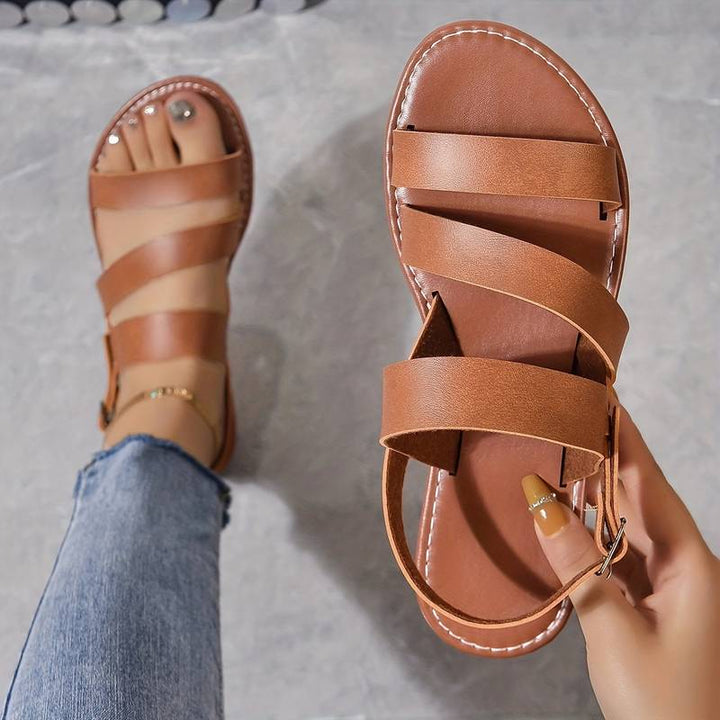 Versatile women's comfortable flat sandals for summer, with a chic three-strap design for everyday wear.