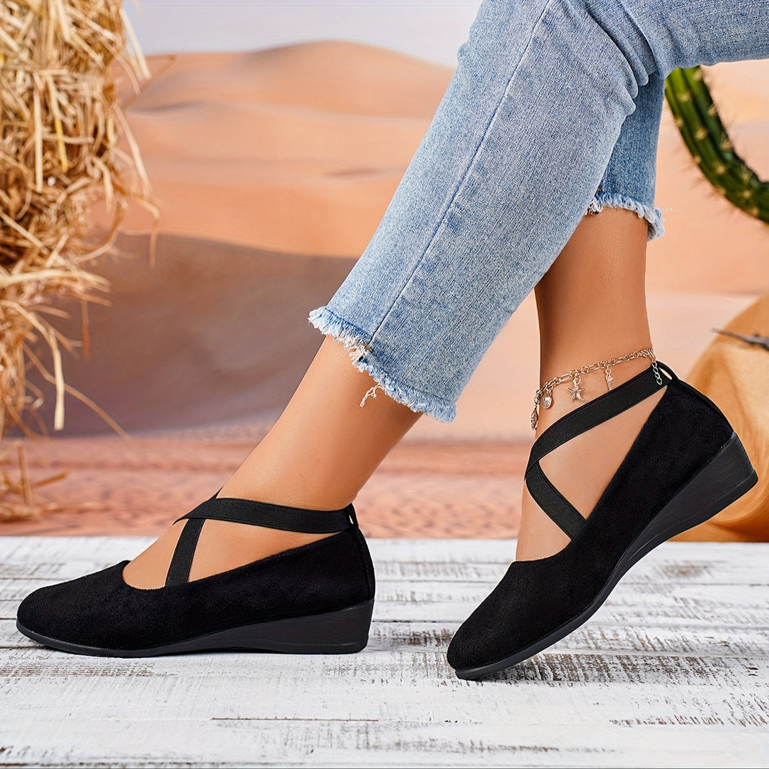 Women's comfortable flat wedge sandals in a neutral tone for versatile summer fashion and everyday wear.