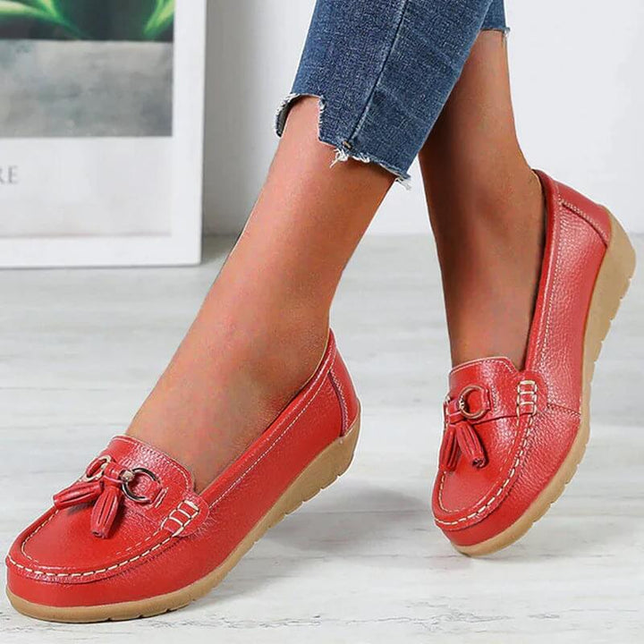 Stylish women's leather footwear: comfortable slip-ons, perfect for versatile everyday and office elegance.