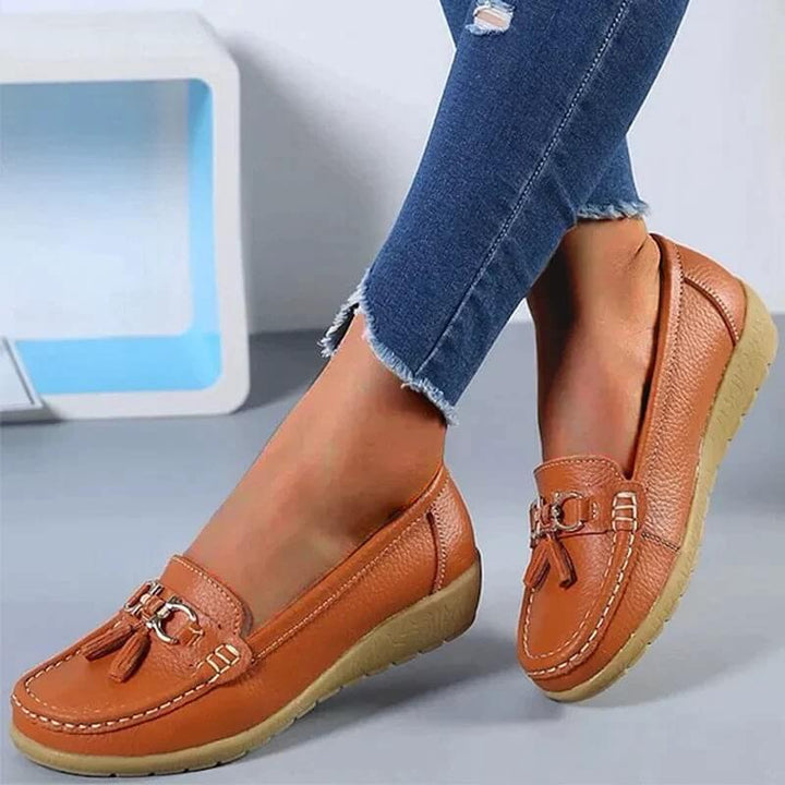 Classic women's leather slip-ons, designed for comfortable office wear and elegant smart casual looks.