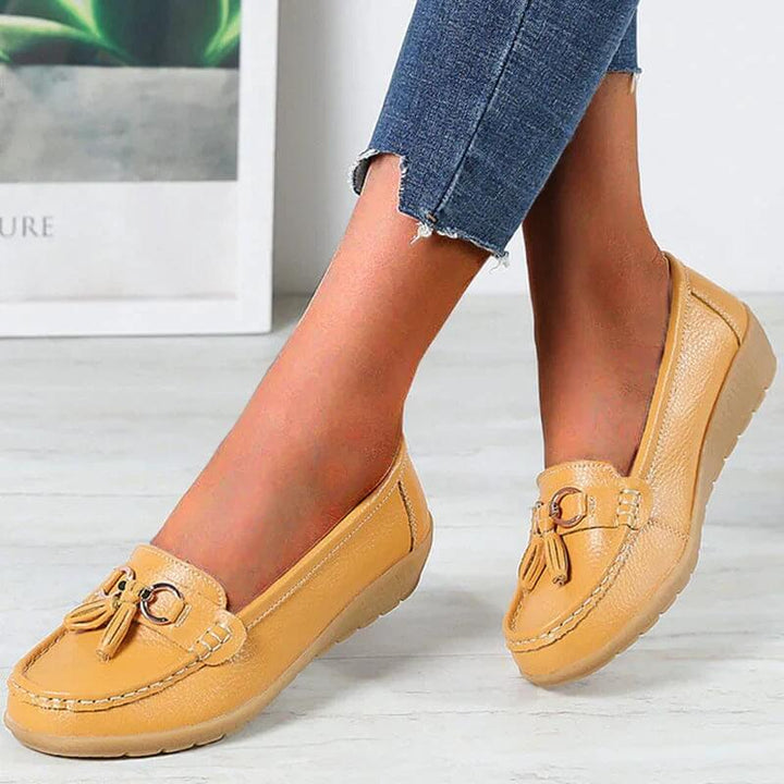 Modern elegant women's leather slip-ons, offering ultimate comfort for stylish daily wear.