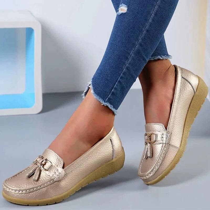 Easy-to-wear women's leather slip-ons, providing a comfortable, elegant, and timeless footwear option.