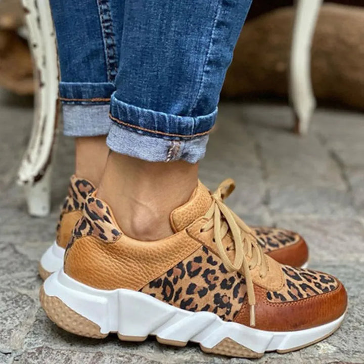 Stylish women's athletic sneakers with a trendy leopard print design