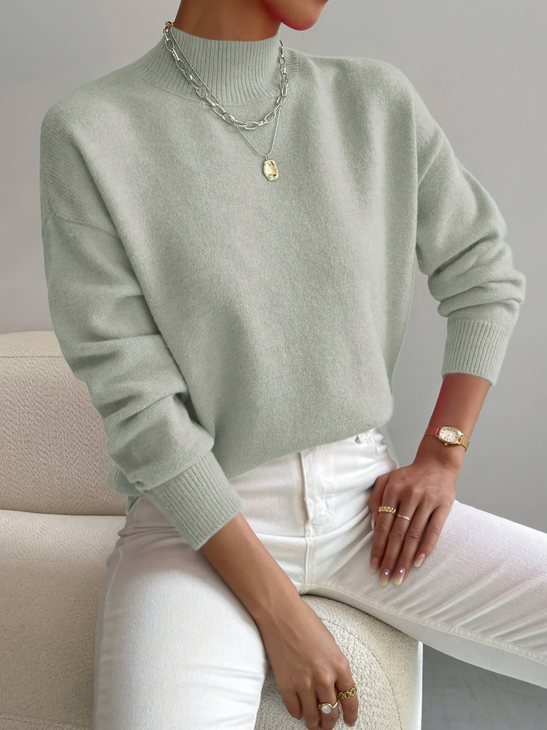 Women's comfortable lilac mock neck sweater, relaxed fit, perfect for spring layering.