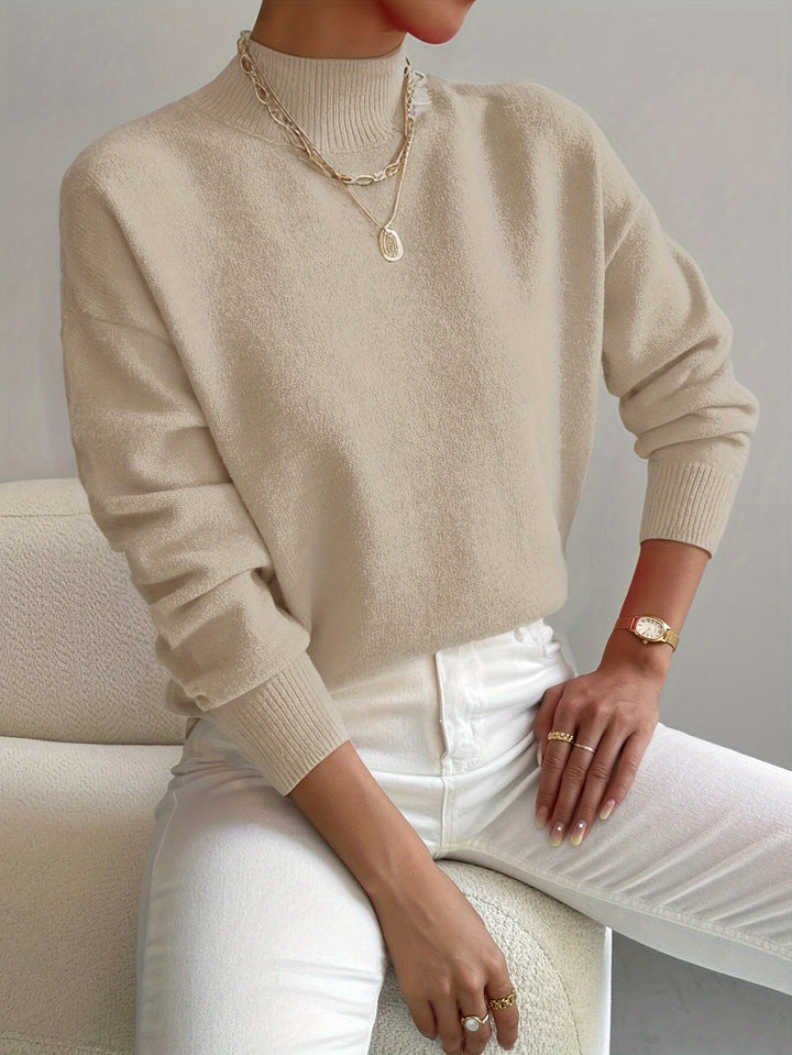 Spring-ready women's mock neck sweater in a soft, breathable knit for relaxed wear.