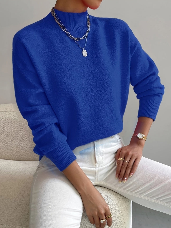 Chic women's mock neck top for spring, offering comfort and a fashionable layered look.