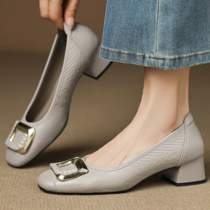Women's comfortable low block heel pumps in black with square toe & gold buckle, perfect for work or daily wear