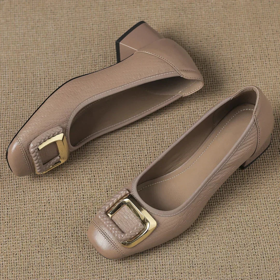 Sophisticated women's dress shoes: black comfortable low block heels with a chic square toe and decorative gold buckle