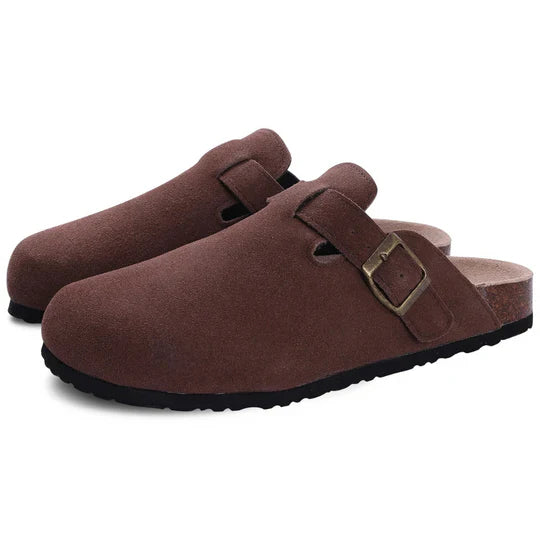 Women's orthopedic comfort slippers designed for all-day wear. Features a supportive design suitable for indoors & outdoors.