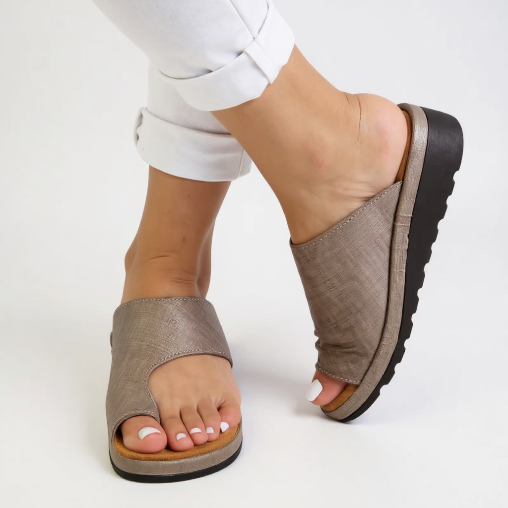 Orthopedic toe split summer sandals for women, designed for comfort, with a soft footbed, side view.