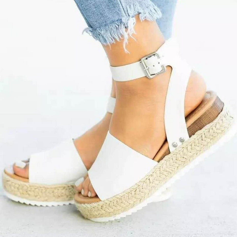 Stylish women's open-toe wedge sandals with a comfortable platform for everyday wear
