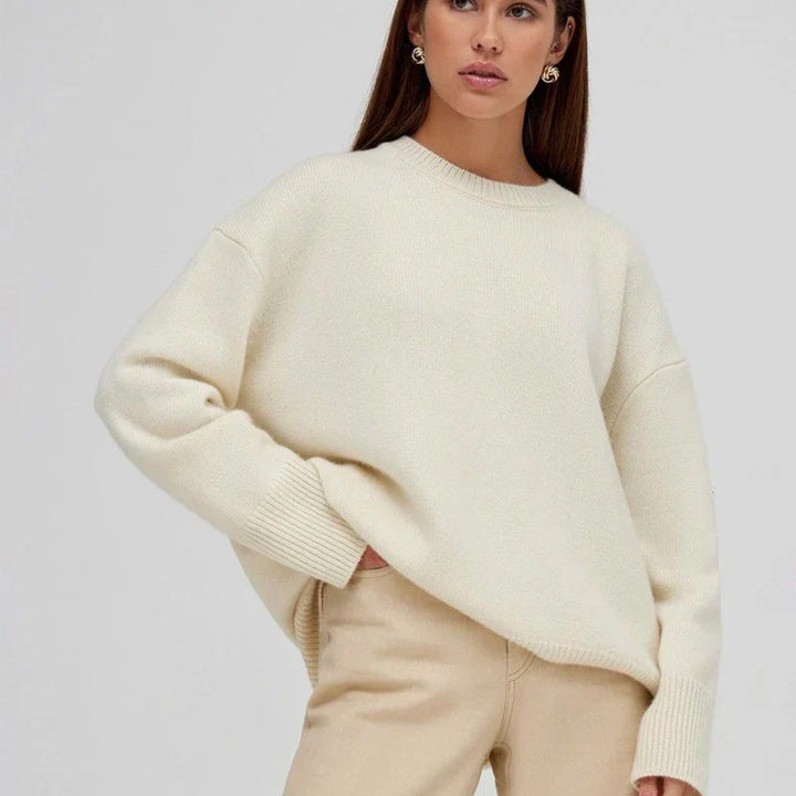Women's comfortable ribbed cuff winter sweater in a neutral color, perfect for cozy casual wear.