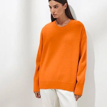 Casual long sleeve women's sweater featuring prominent ribbed cuffs, a warm wardrobe staple.