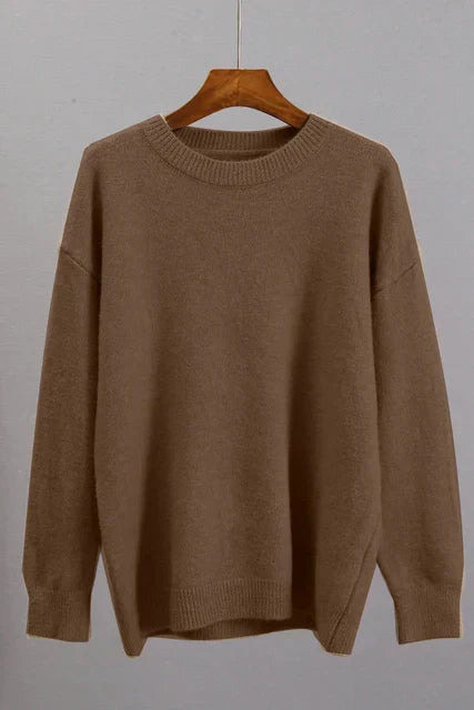 Women wearing a cozy ribbed cuff winter sweater, showcasing its comfortable fit and style.