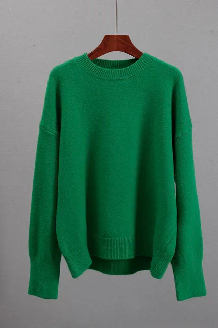 Warm women's knit sweater with flattering ribbed cuffs, essential winter fashion for everyday wear.