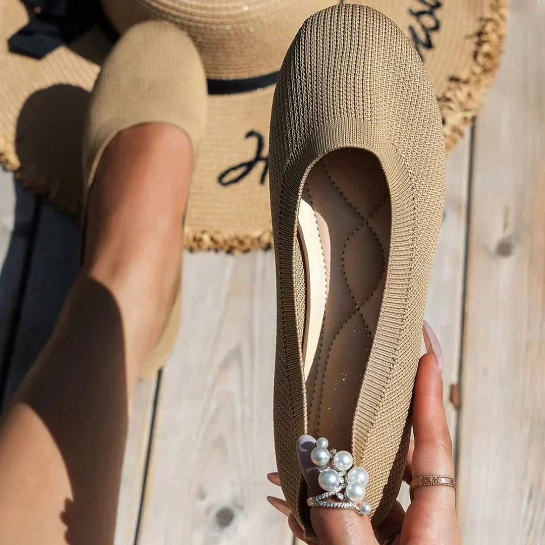 Smooth women's slip-on ballerina flats, offering comfort, flexibility, and elegant style.