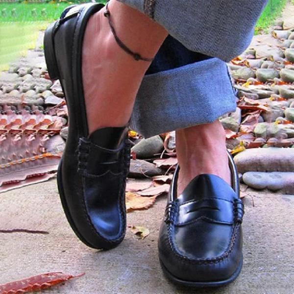 Stylish women's leather loafers with comfortable slip-on design. Perfect versatile flat footwear for everyday & office.
