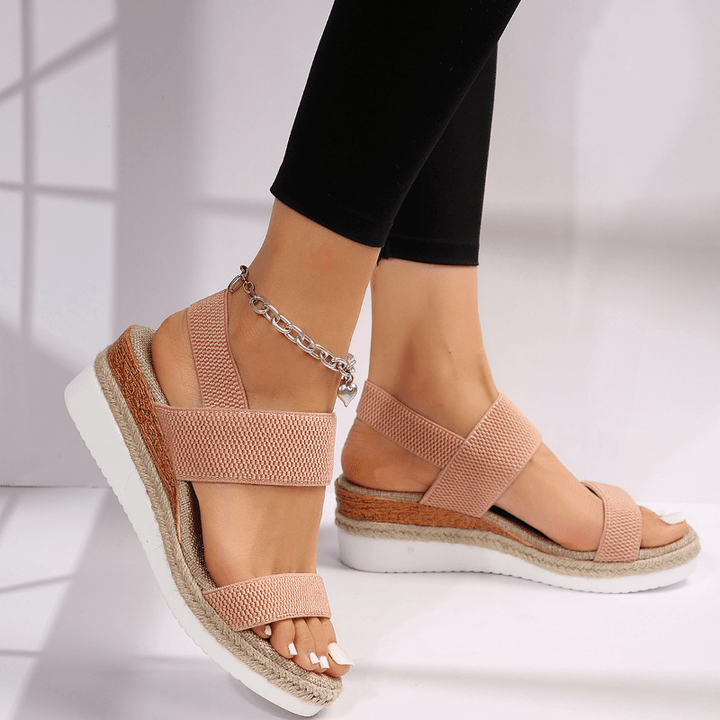 Fashionable women's platform sandals with stretch straps, ideal comfortable summer shoes.