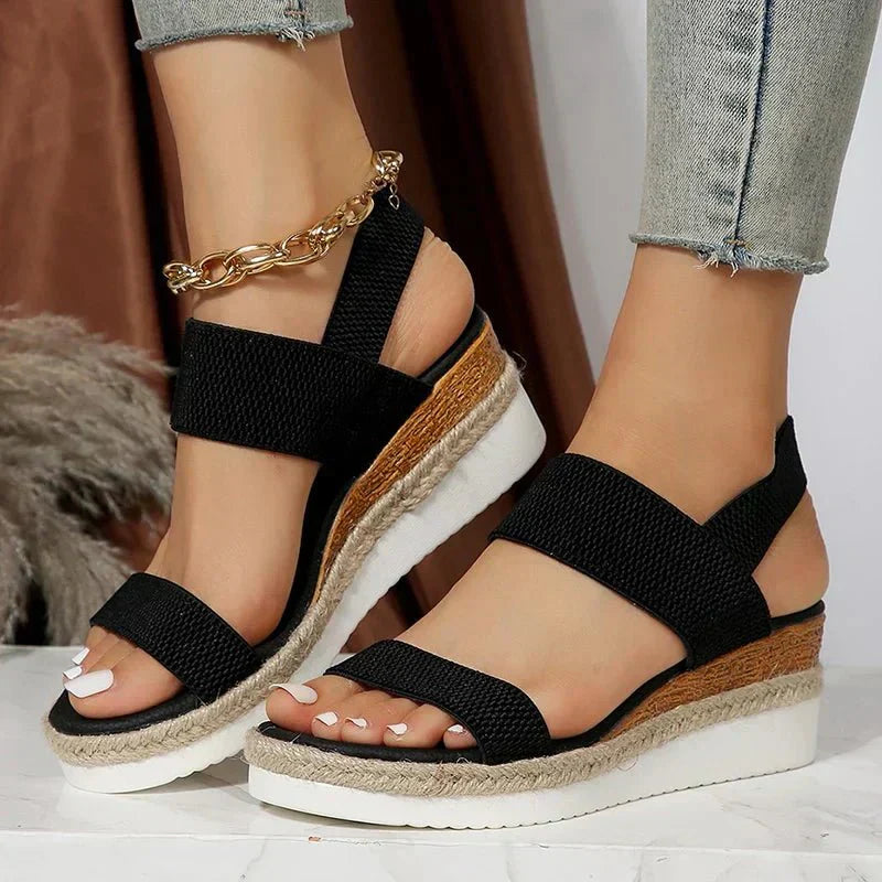 Elevated women's platform sandals, designed with comfortable stretch straps for summer casual style.