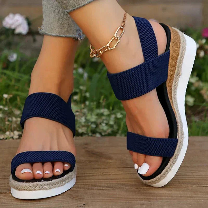 Casual women's platform sandals with soft stretch straps, offering comfortable summer and everyday wear.
