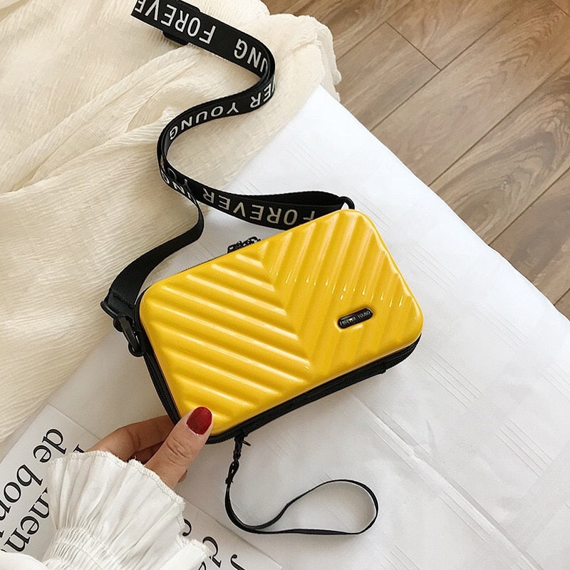 Compact hard shell travel handbag, 1+1 FREE women's waterproof crossbody for essentials.