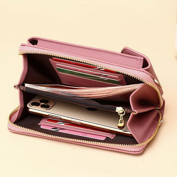 Red women's compact PU leather crossbody bag, adjustable strap, vibrant fashion accessory.