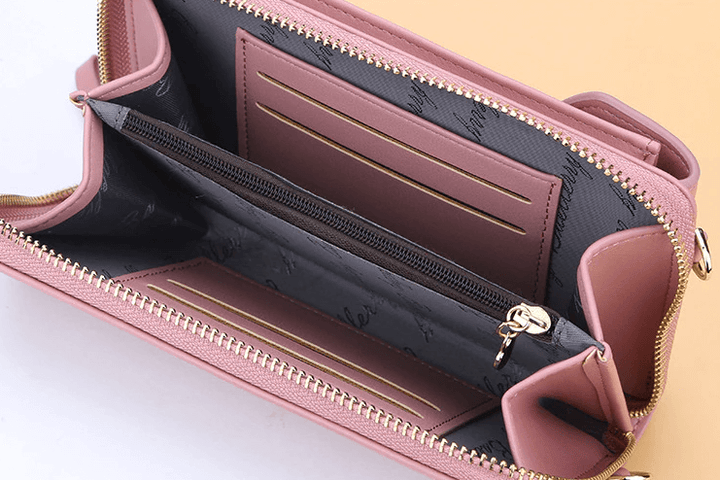 Small women's PU leather crossbody bag, compact and elegant, adjustable strap for perfect fit.
