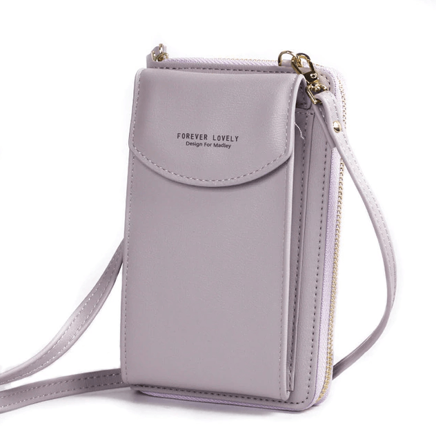 Elegant small PU leather shoulder bag for women, versatile compact design, secure closure.
