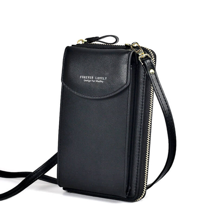 Secure magnetic clasp on women's compact PU leather crossbody bag with adjustable strap.