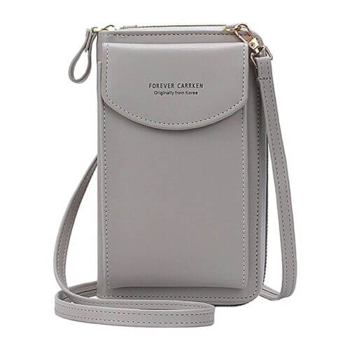 Stylish women's PU leather crossbody with adjustable strap, compact for essentials, fashion accessory.