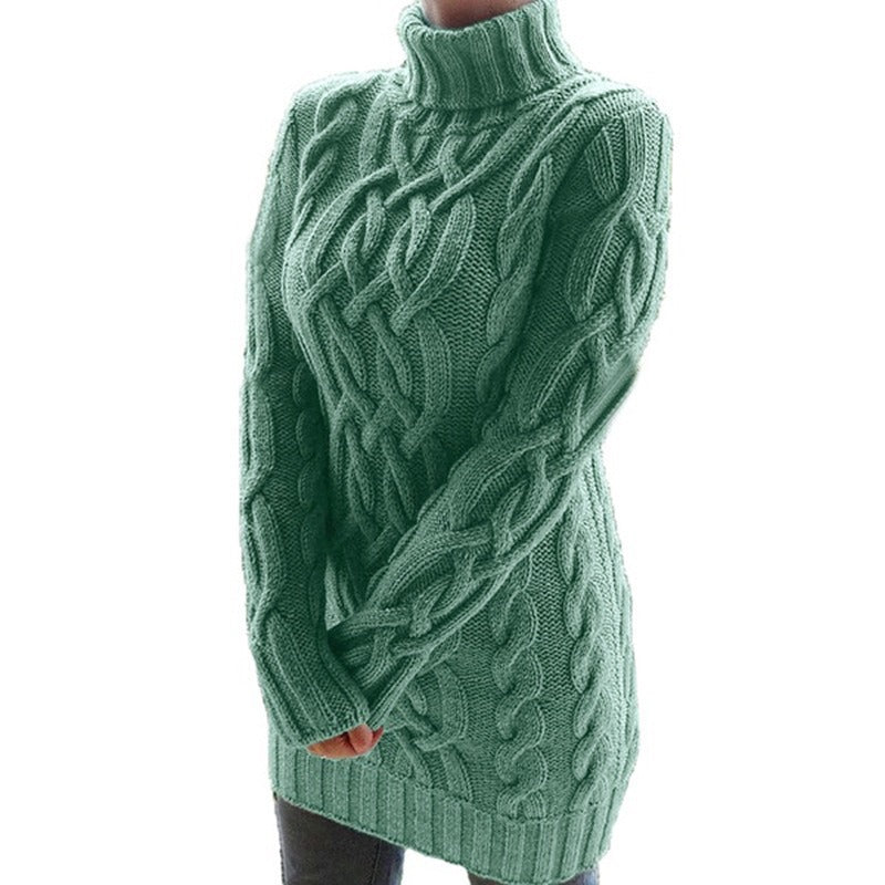 Warm women's pullover: a cozy cable-knit turtleneck sweater dress with elegant style.