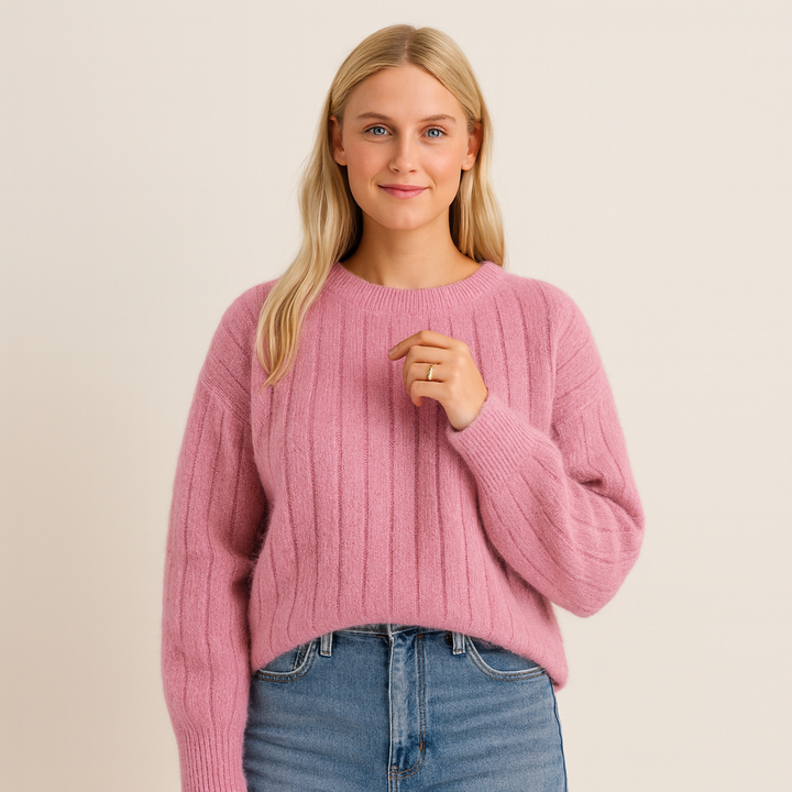 Women's cozy cream knit pullover sweater, perfect for winter casual fashion and warmth.